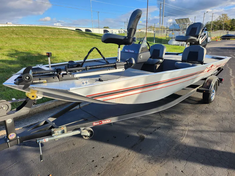 Slide: The Image of 2020 Tracker Bass Tracker Classic XL fishing boat on trailer, parked outdoors. - 7