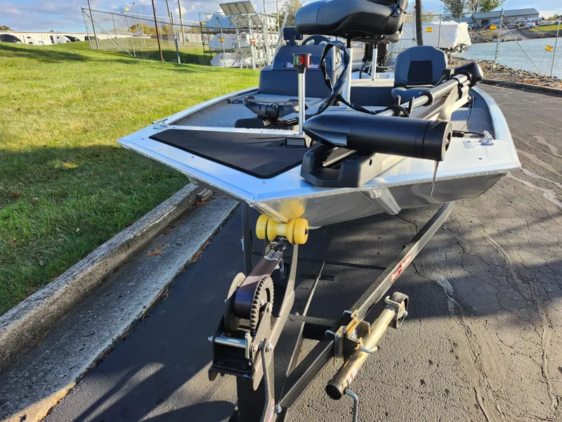 Slide: The Image of 2020 Tracker Bass Tracker Classic XL boat on trailer, parked on asphalt near grass. - 8