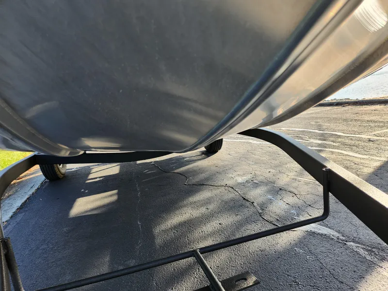 Slide: The Image of 2020 Tracker Bass Tracker Classic XL boat on a trailer, viewed from below. - 9