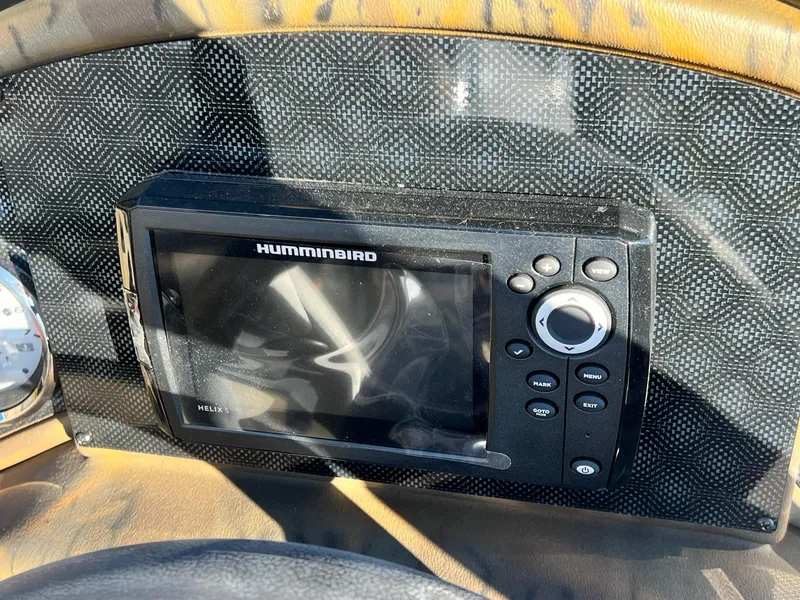 Slide: The Image of Humminbird Helix 5 fish finder on 2025 G3 Sportsman 1610 Vinyl dashboard. - 13