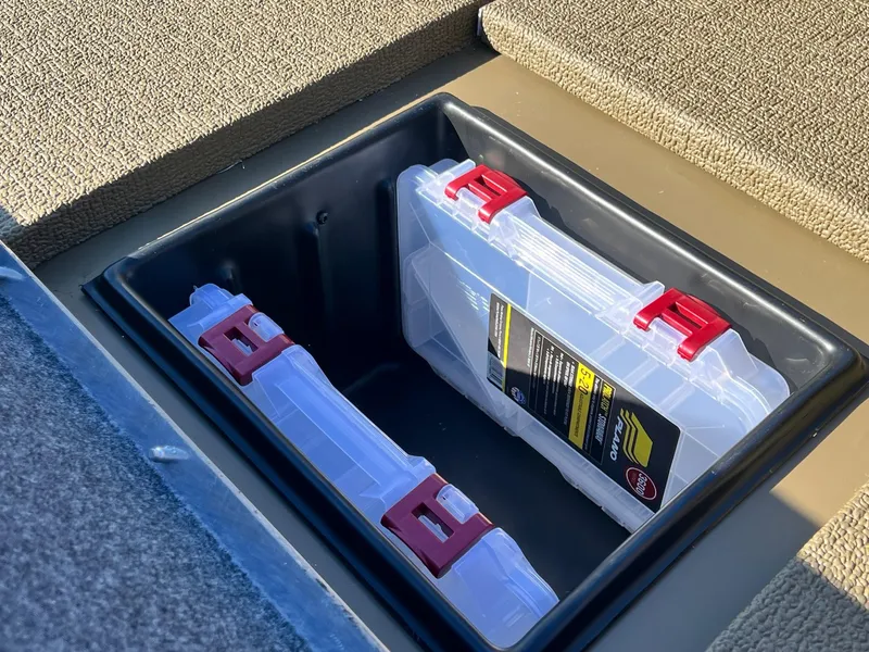 Slide: The Image of Storage compartment with tackle boxes in 2025 G3 Sportsman 1610 Vinyl boat. - 21