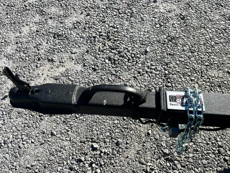 Slide: The Image of Trailer hitch with chain on gravel, 2025 G3 Sportsman 1610 Vinyl. - 32