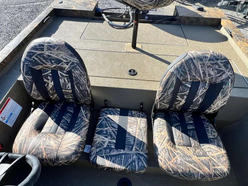 Slide: The Image of 2025 G3 Sportsman 1610 Vinyl boat seats with camouflage pattern. - 33