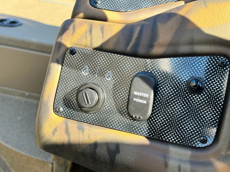 Slide: The Image of Control panel of 2025 G3 Sportsman 1610 Vinyl boat with master power switch. - 37