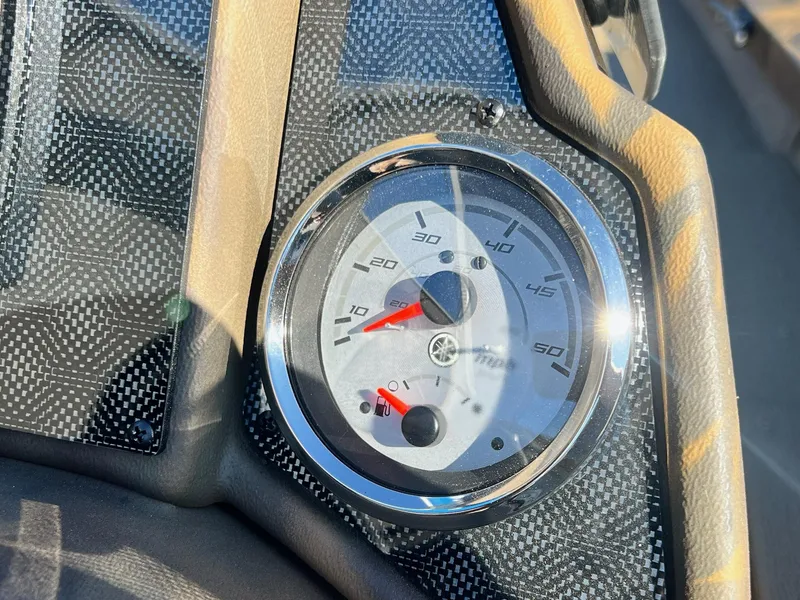 Slide: The Image of Close-up of 2025 G3 Sportsman 1610 Vinyl speedometer with carbon fiber dashboard. - 38