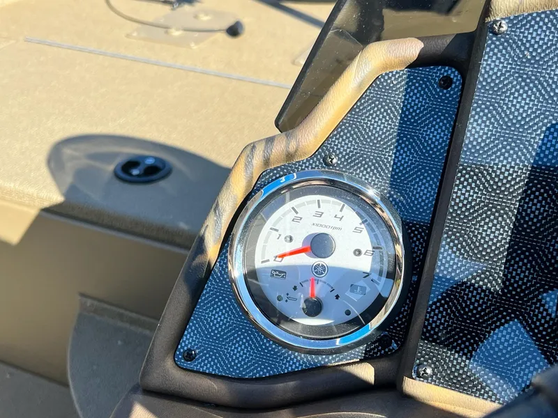 Slide: The Image of Close-up of 2025 G3 Sportsman 1610 Vinyl boat dashboard with tachometer. - 7