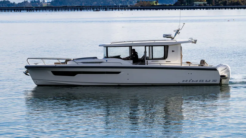Slide: The Image of Nimbus C11 2021 boat cruising on calm waters. - 35