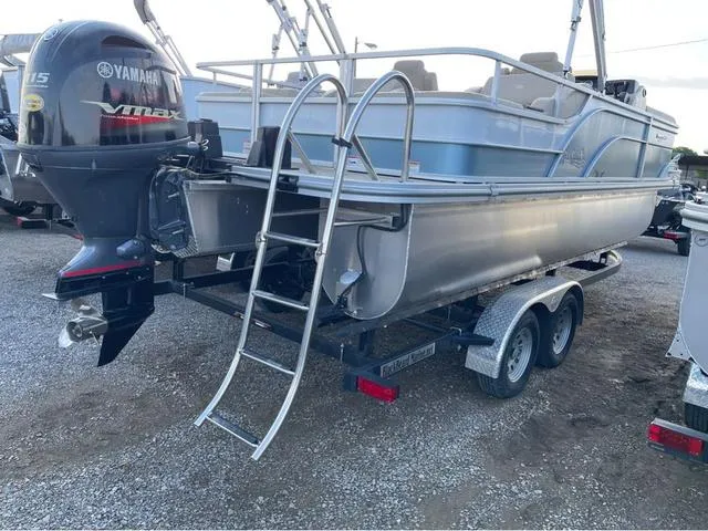 Slide: The Image of 2023 SunCatcher Select 22SS pontoon boat with Yamaha VMAX engine and trailer. - 4