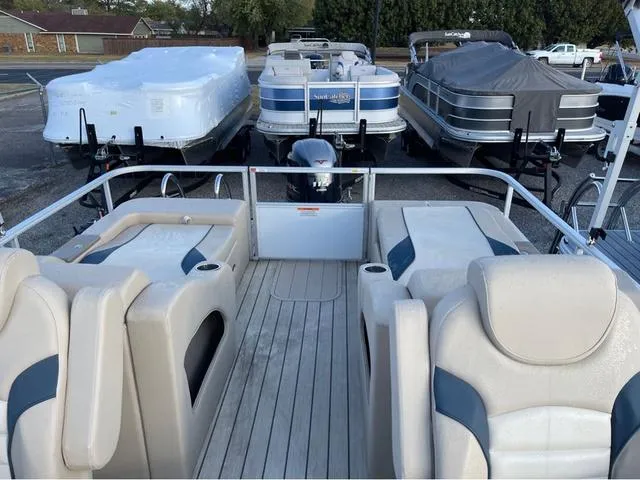 Slide: The Image of 2023 SunCatcher Select 22SS pontoon boat interior with seating and deck view. - 6