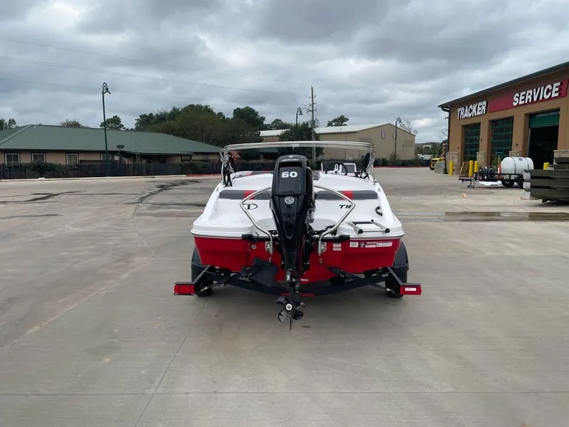 Slide: The Image of 2025 Tahoe T16 boat with outboard motor in service area. - 3