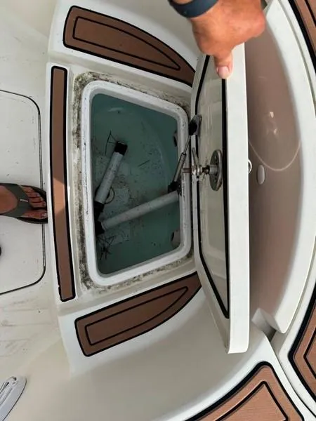Slide: The Image of 2016 SeaVee 270Z boat storage compartment with open hatch. - 15