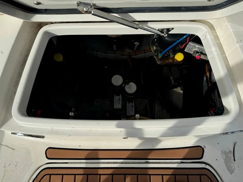 Slide: The Image of Open hatch of 2016 SeaVee 270Z boat showing internal components. - 23
