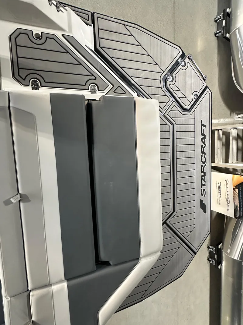 Slide: The Image of 2025 Starcraft SVX 211 IO boat deck with sleek design and modern features. - 13