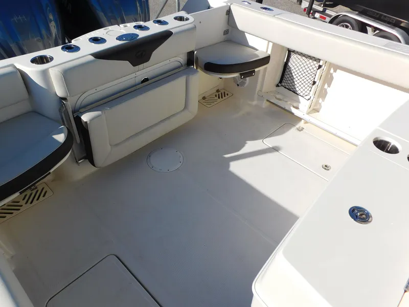 Slide: The Image of Spacious deck of 2023 Sailfish 290 CC boat with seating and storage. - 24