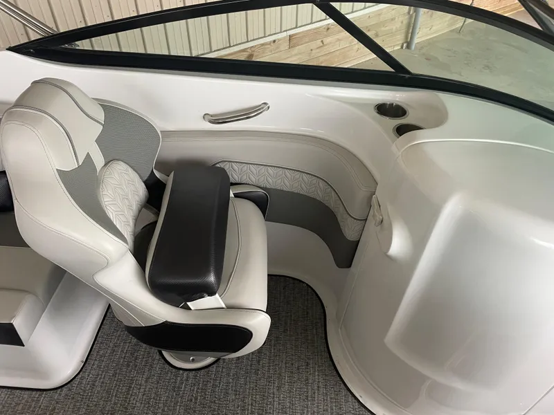 Slide: The Image of 2022 Hurricane SunDeck 2200 DC OB boat interior with plush seating and modern design. - 10