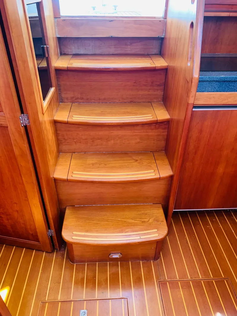 Slide: The Image of Wooden interior stairs of 2004 Sabre 42 Hardtop Express yacht. - 17