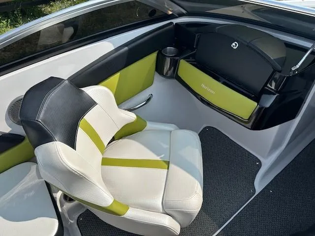 Slide: The Image of 2016 Four Winns H180 boat interior with stylish seating and modern design. - 10