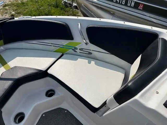 Slide: The Image of 2016 Four Winns H180 boat interior with cushioned seating and stylish design. - 13