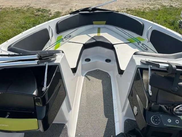 Slide: The Image of 2016 Four Winns H180 boat interior with seating and storage compartments. - 15