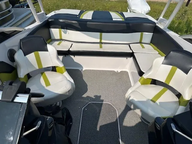 Slide: The Image of 2016 Four Winns H180 boat interior with stylish seating and modern design. - 18