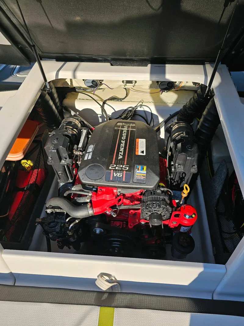 Slide: The Image of 2016 Four Winns H180 boat engine compartment with V6 225 horsepower engine. - 22