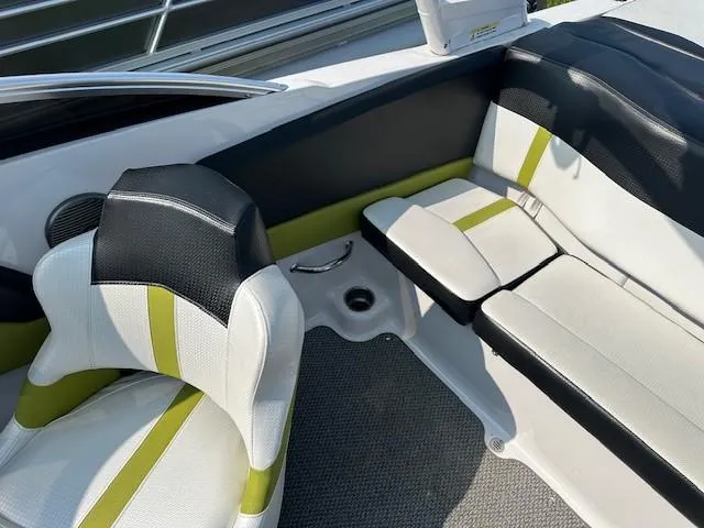 Slide: The Image of 2016 Four Winns H180 boat interior with stylish seating and modern design. - 7