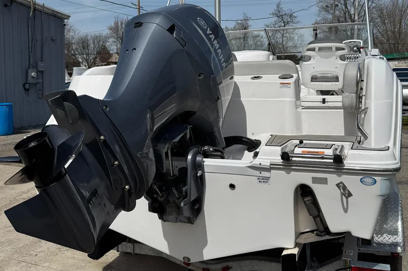 Slide: The Image of 2024 Sea Fox 226 Traveler boat with Yamaha outboard motor, rear view. - 12