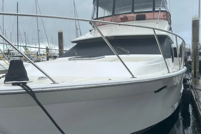 The Image of 1988 Ocean Alexander 42 aft cabin yacht docked at marina. - 1