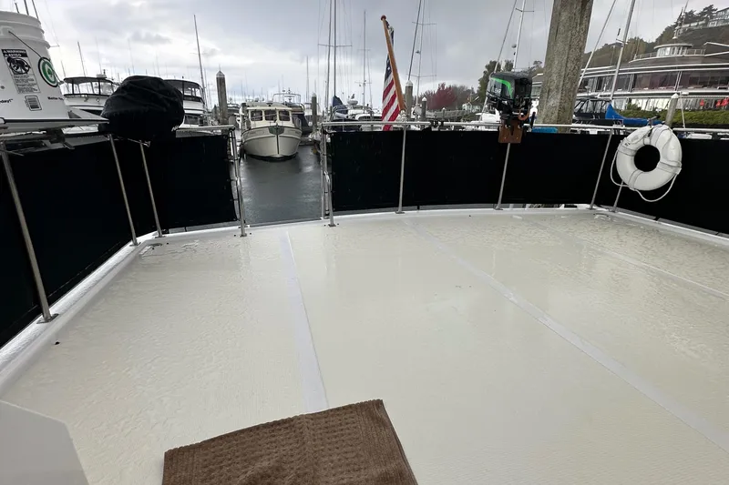 Slide: The Image of Ocean Alexander 42 aft cabin yacht deck, 1988 model, docked at marina. - 4