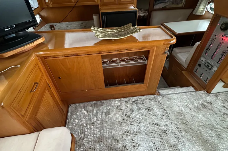 Slide: The Image of Interior of 1988 Ocean Alexander 42 aft cabin with wooden cabinetry and modern decor. - 5