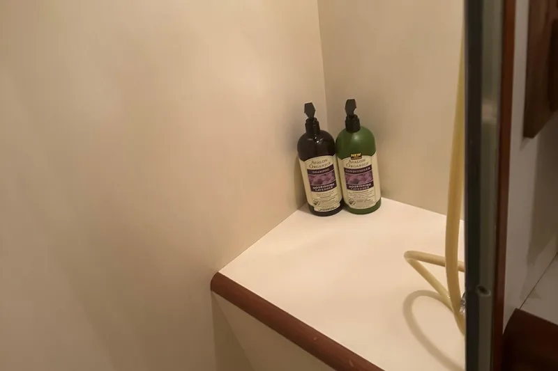 Slide: The Image of Shower corner with shampoo bottles in 1988 Ocean Alexander 42 aft cabin yacht. - 9