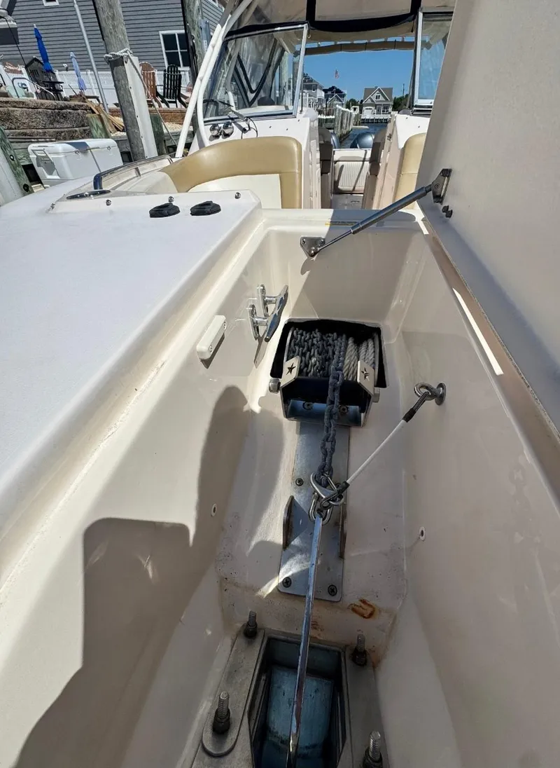 Slide: The Image of 2014 Grady-White Freedom 307 boat interior with anchor storage compartment. - 35