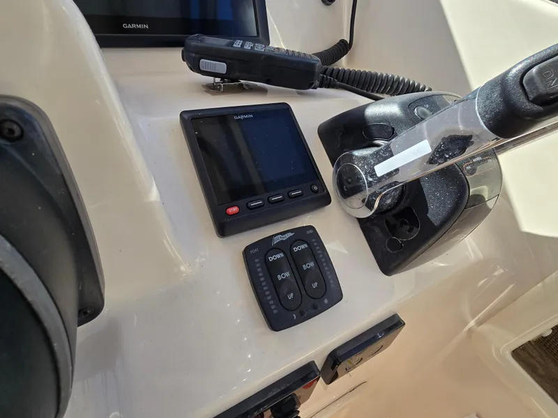 Slide: The Image of Control panel of 2014 Grady-White Freedom 307 boat with Garmin electronics. - 8