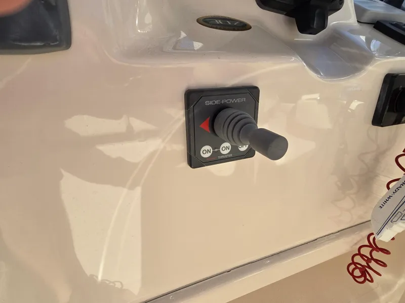 Slide: The Image of 2014 Grady-White Freedom 307 boat control panel with Side-Power joystick. - 9