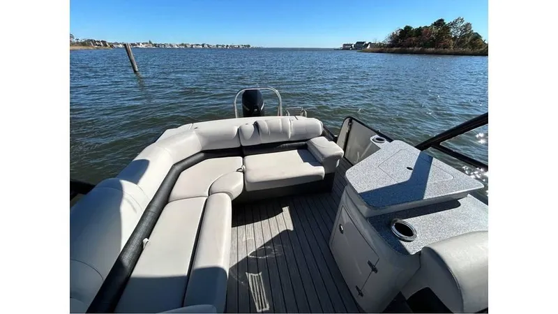 Slide: The Image of 2020 Avalon Catalina Platinum 2785 EL-W pontoon boat interior on a sunny day. - 14
