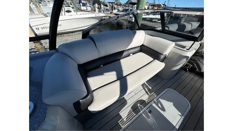 Slide: The Image of 2020 Avalon Catalina Platinum 2785 EL-W boat interior with plush seating and sleek design. - 15