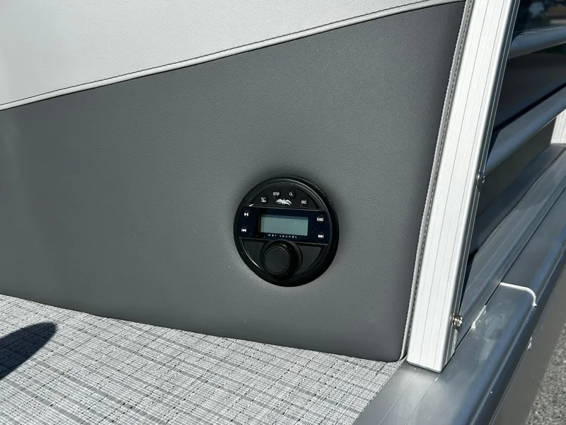 Slide: The Image of Control panel on 2025 Berkshire 23RFX STS 3.0 boat interior. - 24