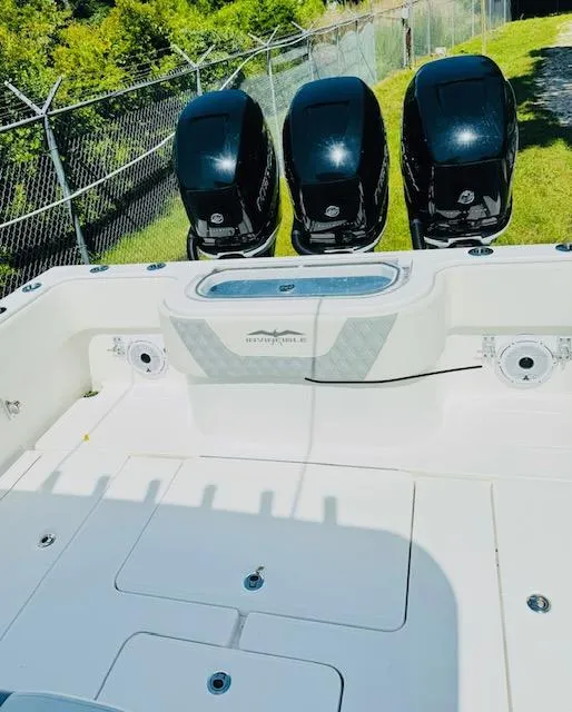 Slide: The Image of 2022 Invincible 36 Open Fisherman boat with triple outboard engines. - 15