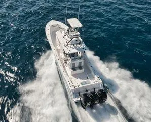 Slide: The Image of 2022 Invincible 36 Open Fisherman boat cruising on open water. - 3