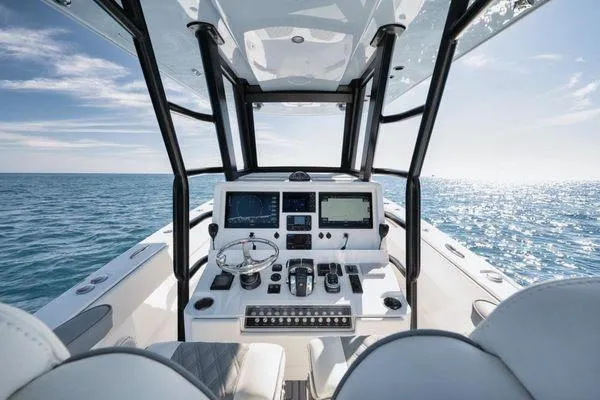 Slide: The Image of 2022 Invincible 36 Open Fisherman boat dashboard with ocean view. - 6