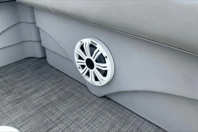 Slide: The Image of Speaker on 2021 Bennington 22 SL boat interior with gray upholstery and carpet. - 20
