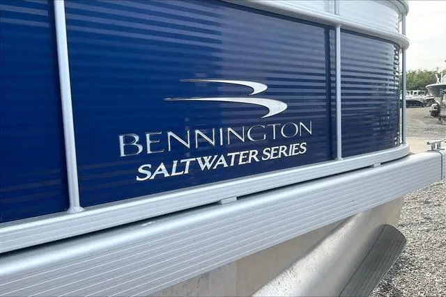 Slide: The Image of 2021 Bennington 22 SL Saltwater Series pontoon boat, blue exterior detail. - 26