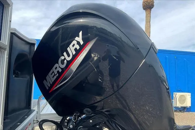 Slide: The Image of Mercury outboard motor on a 2021 Bennington 22 SL boat. - 28
