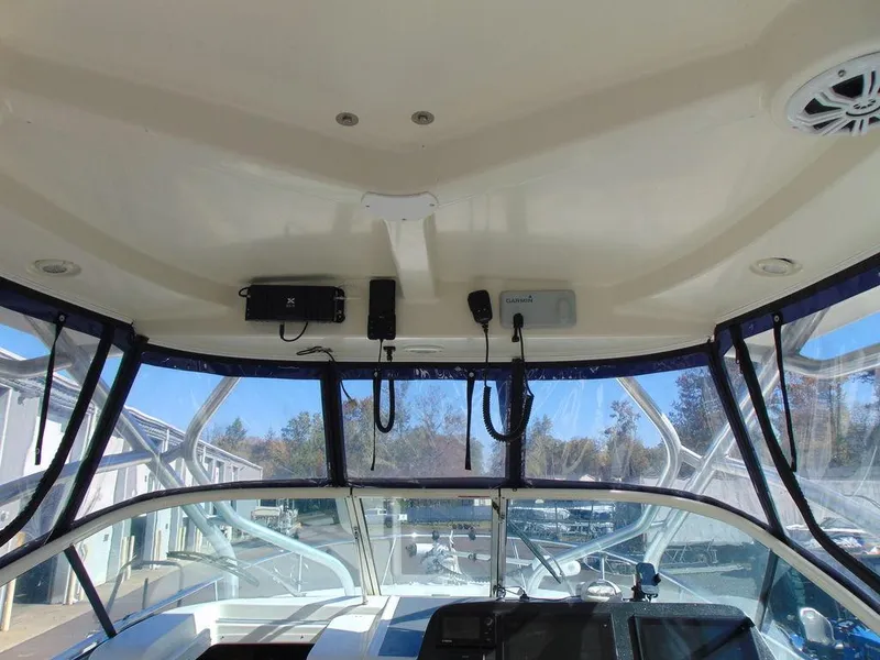 Slide: The Image of Interior view of 2011 Hydra-Sports 3000VX Express boat cockpit with electronics. - 11