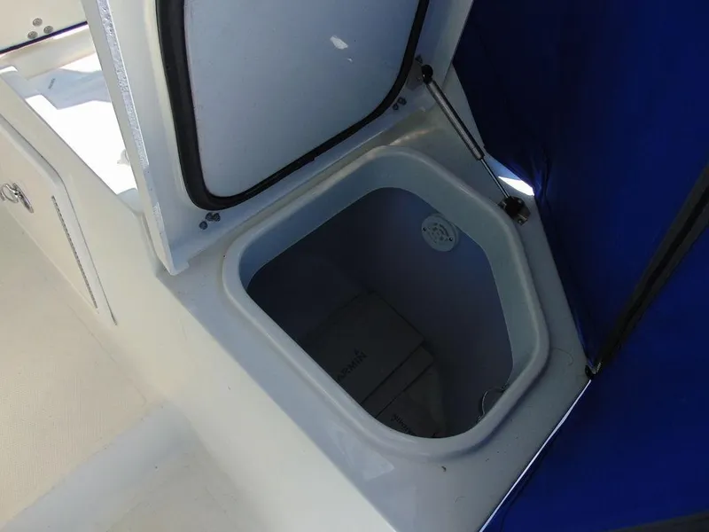 Slide: The Image of 2011 Hydra-Sports 3000VX Express boat storage compartment open. - 15