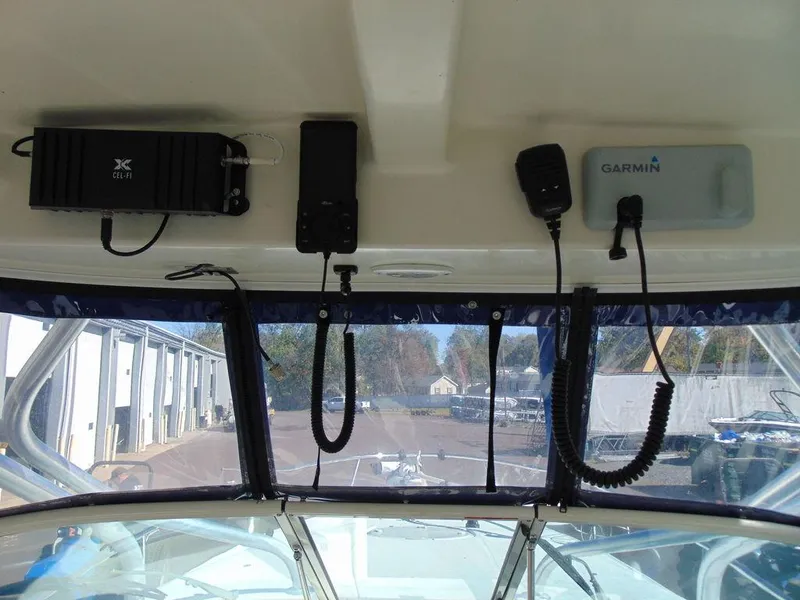 Slide: The Image of 2011 Hydra-Sports 3000VX Express boat cockpit with Garmin electronics and communication devices. - 16