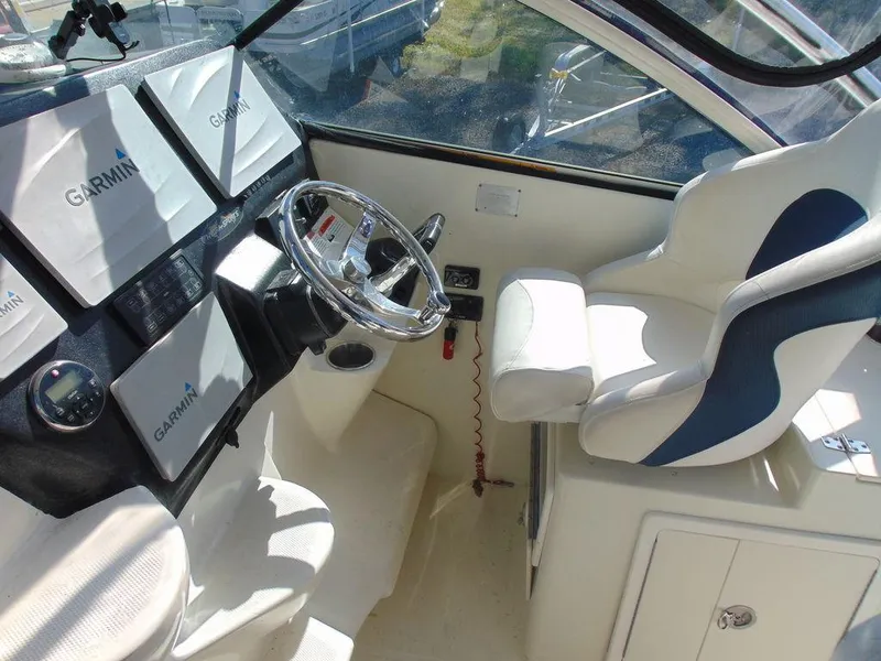 Slide: The Image of Interior of 2011 Hydra-Sports 3000VX Express boat with Garmin navigation system. - 19