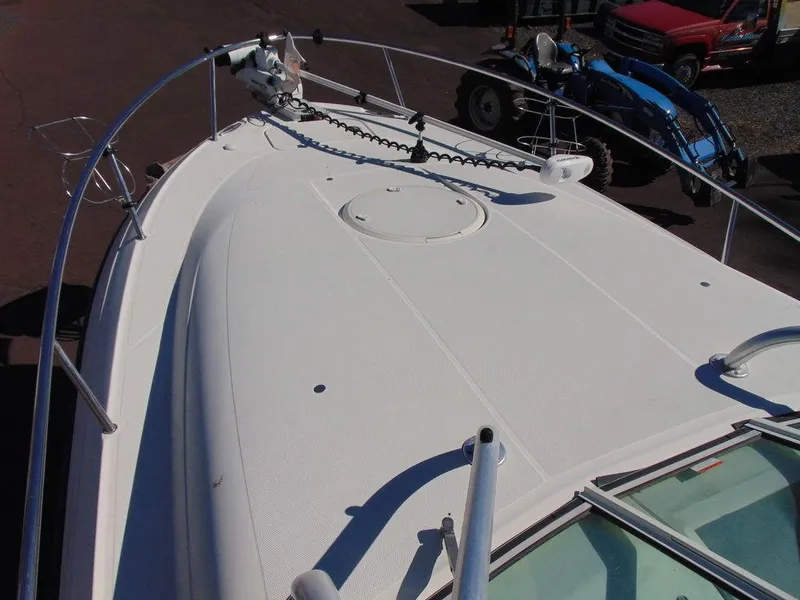 Slide: The Image of 2011 Hydra-Sports 3000VX Express boat deck with railing and anchor system. - 37