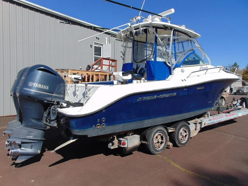 Slide: The Image of 2011 Hydra-Sports 3000VX Express boat on trailer with Yamaha outboard motor. - 4