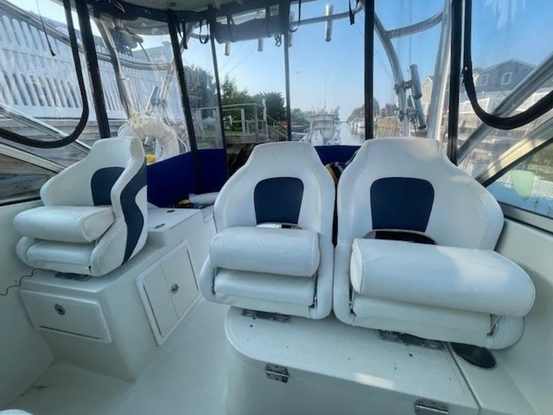 Slide: The Image of 2011 Hydra-Sports 3000VX Express boat interior with white and blue seating. - 41